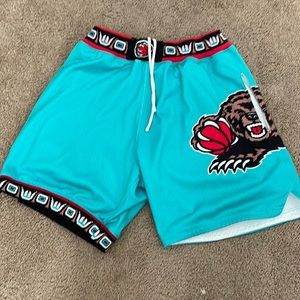 Used Mitchell and Ness Vancouver Grizzlies shorts.